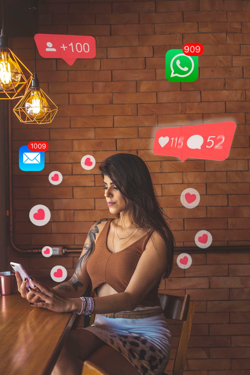 <strong> Watch out for super short missed calls! </strong> Woman using smartphone in cafe with social media notifications around.