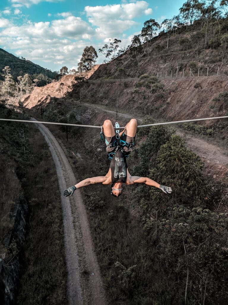 Experience the thrill of an upside down zipline adventure with breathtaking outdoor scenery.