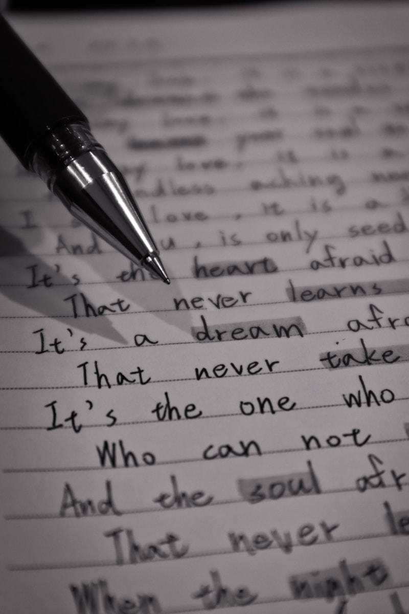 Words That Stick Like Glue Black pen on white paper