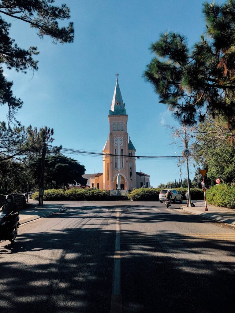 Dalat cathedral with a steeple on a sunny day