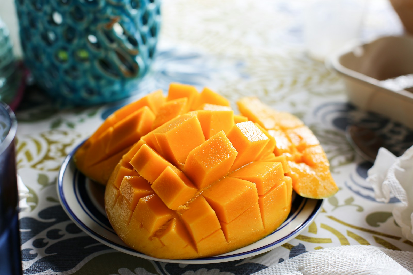 Artisanal Treasures from the Mekong Delta: Foodo’s Journey to Bring Premium Mango Preserves to the World A close up of a plate of mango on a table