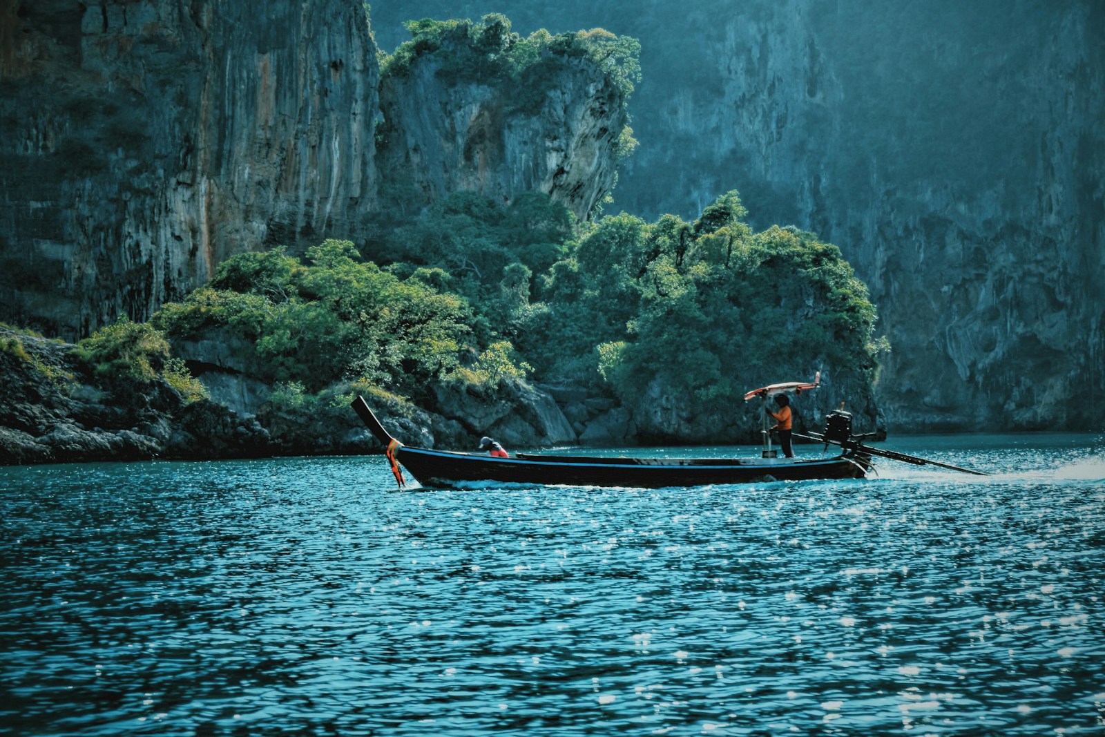Person riding on boat during daytime