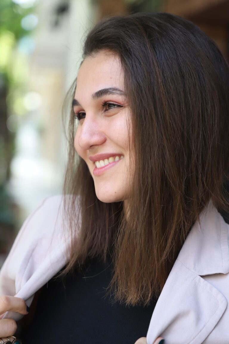 A woman smiling