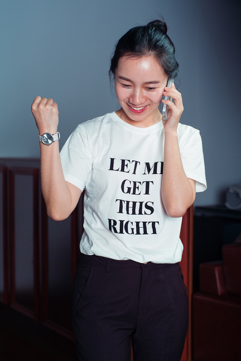 A woman holding smartphone inside